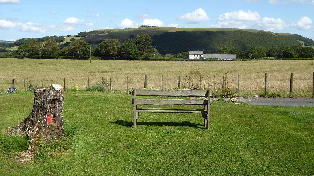 Bench and view of a hill