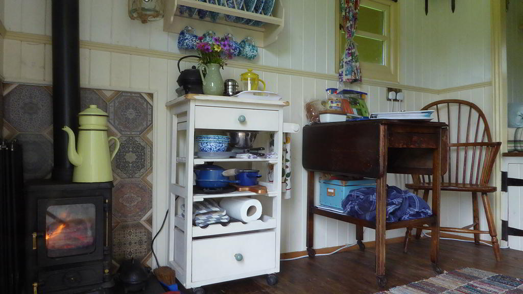 Wood burn stove and kitchen area in the Hygge Hut